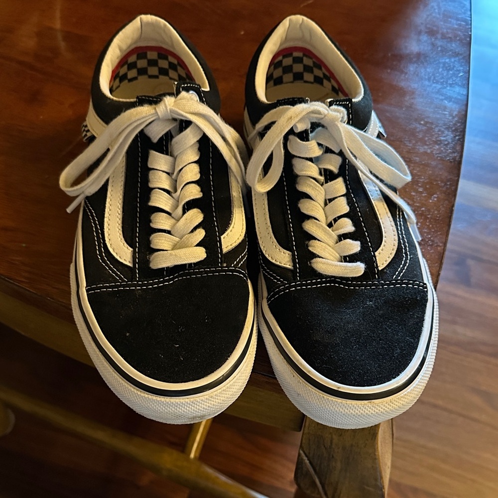 Vans Black & White Low-Top Skate Sneakers with Checker Lining